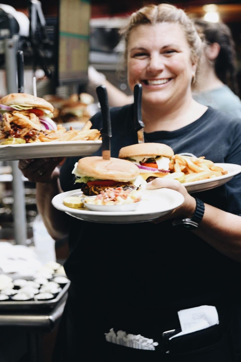 Woodshed server carrying two meals