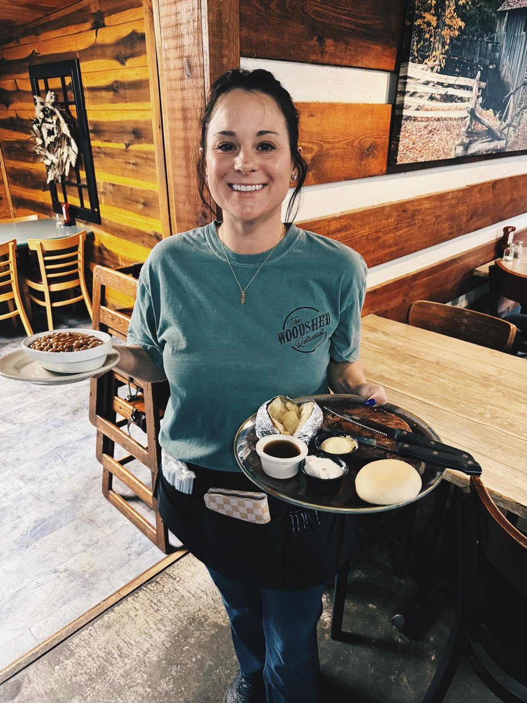 Woodshed server carrying two meals
