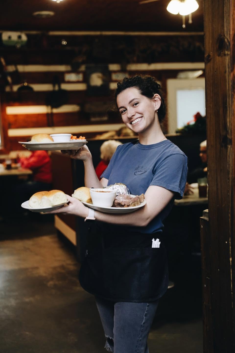Woodshed server carrying two meals