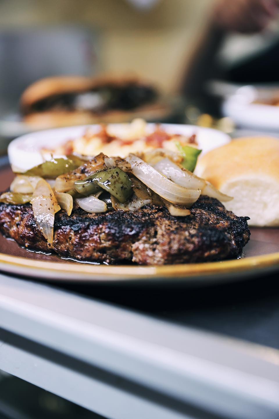 Hamburger steak with peppers and onions